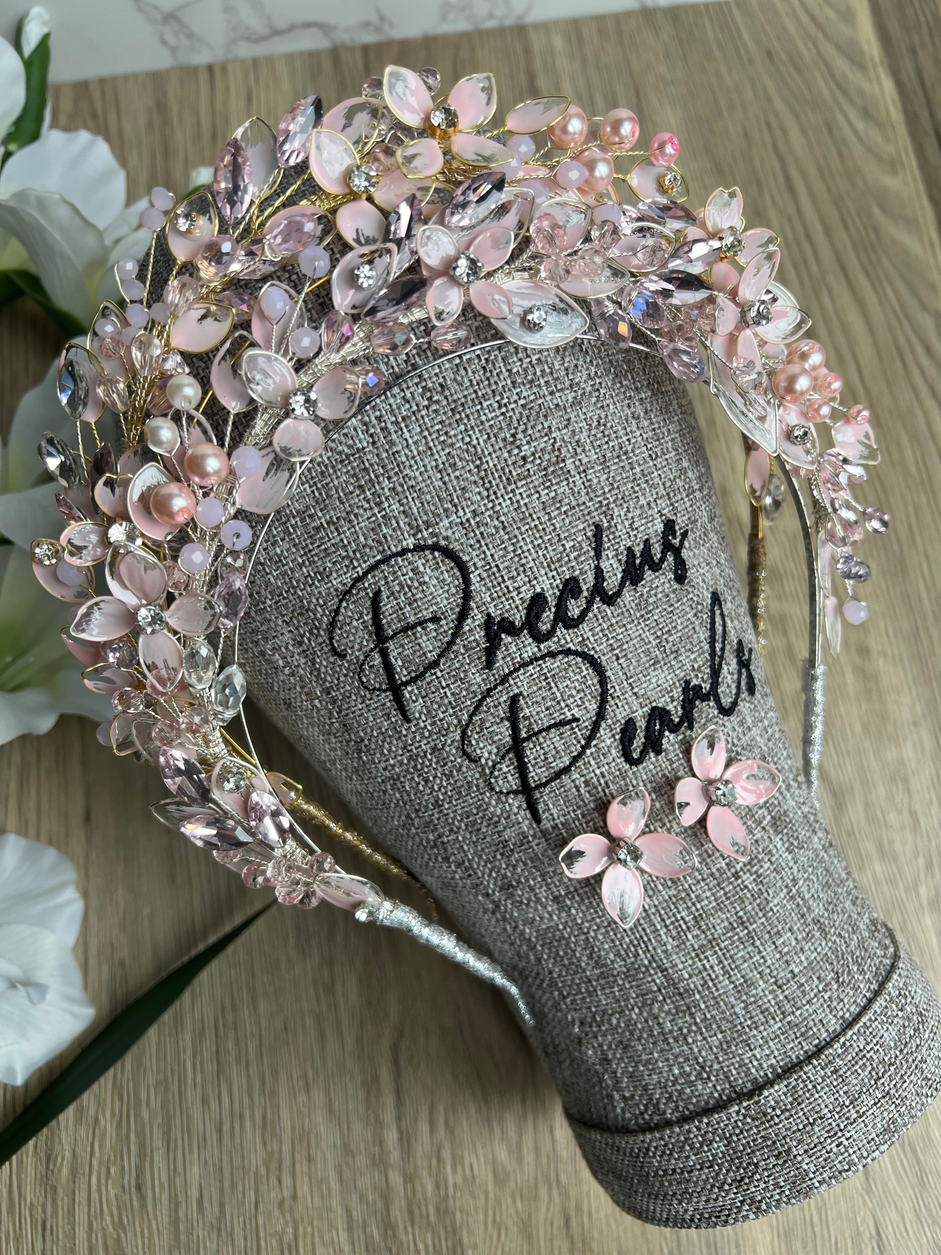 Pink flower and leaf detail wedding guest crown Pink flower and leaf detail wedding guest crown Precius pearls