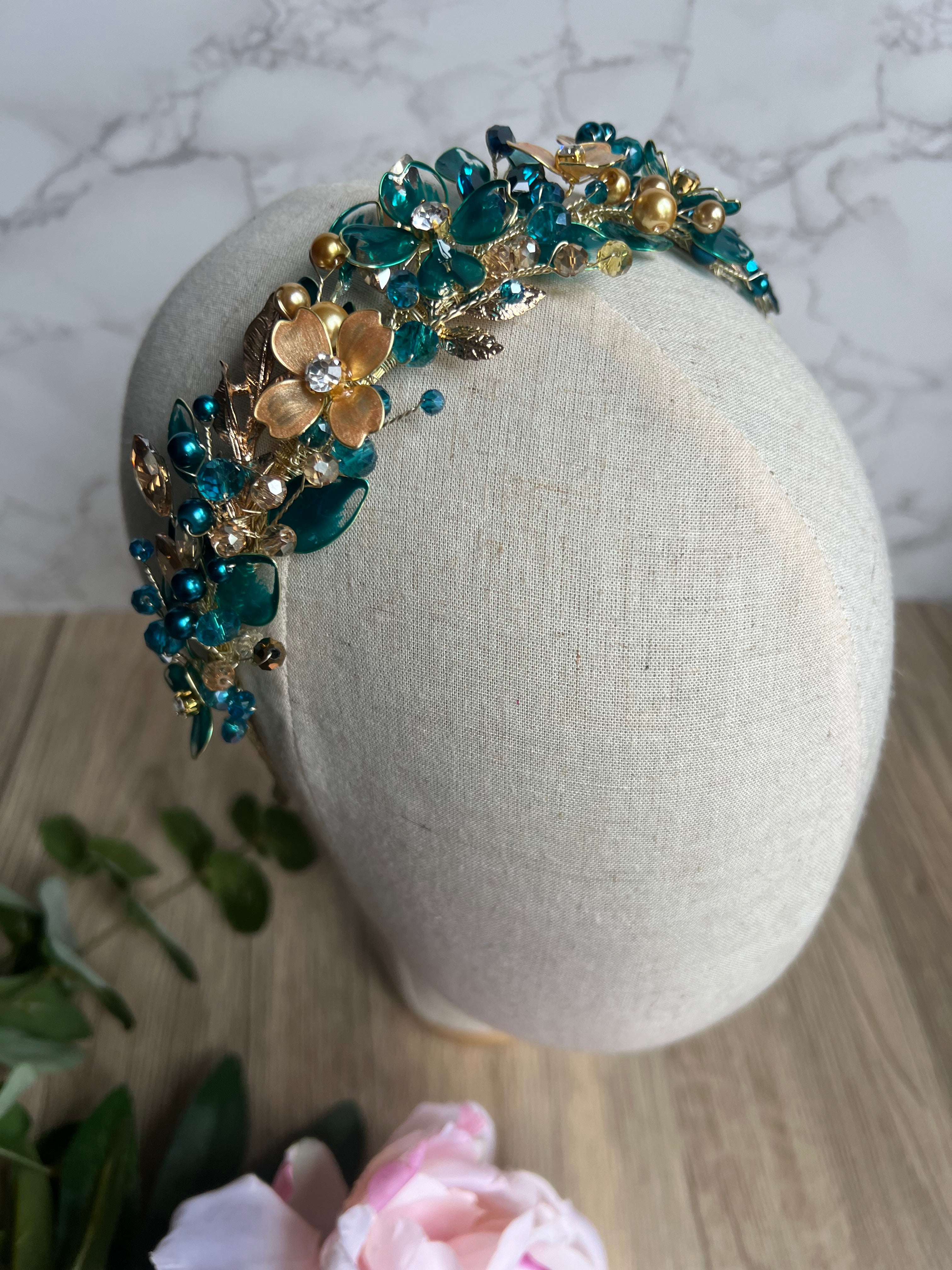 Teal low style wedding guest headpiece Teal low style wedding guest headpiece Precius pearls
