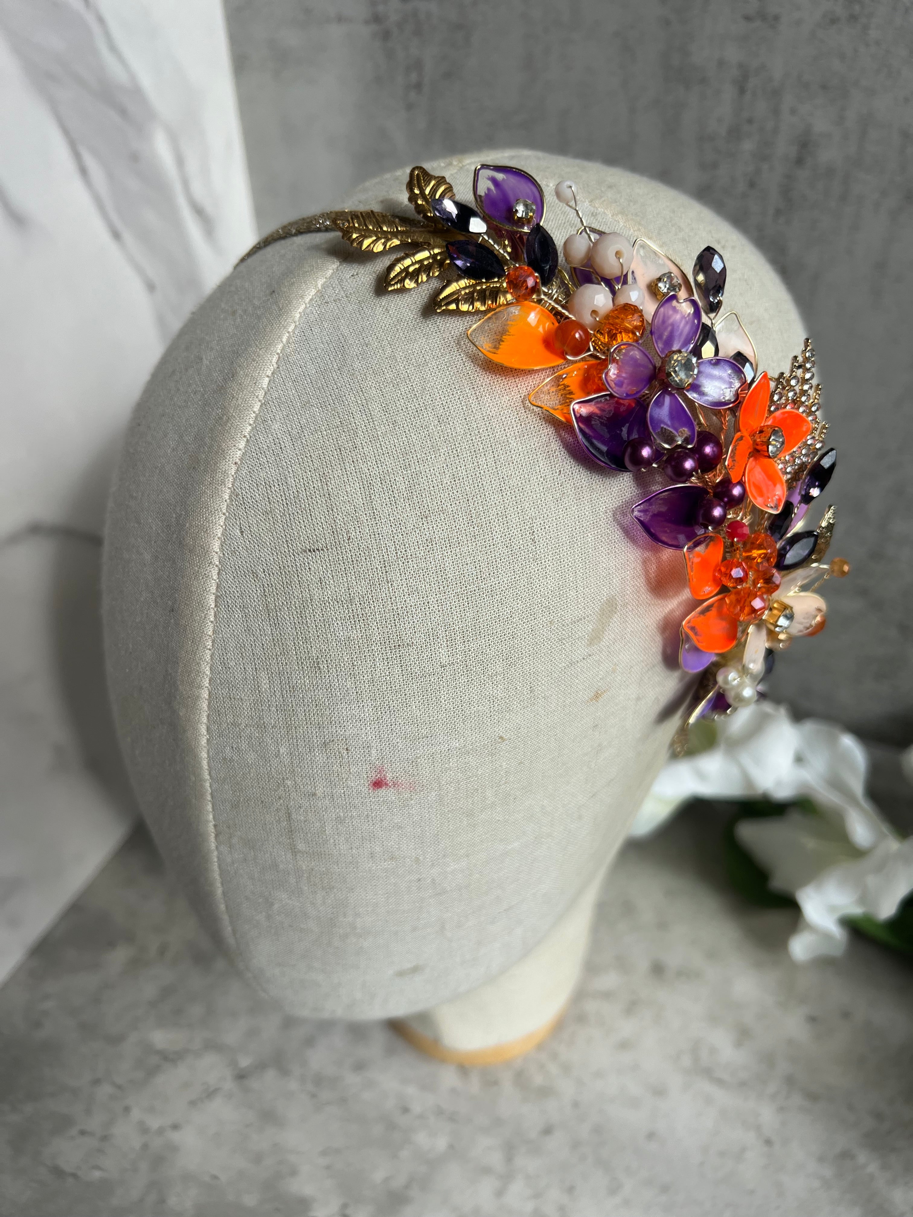 Fuchsia, Purple and Orange side headband Fuchsia, Purple and Orange side headband Precius pearls