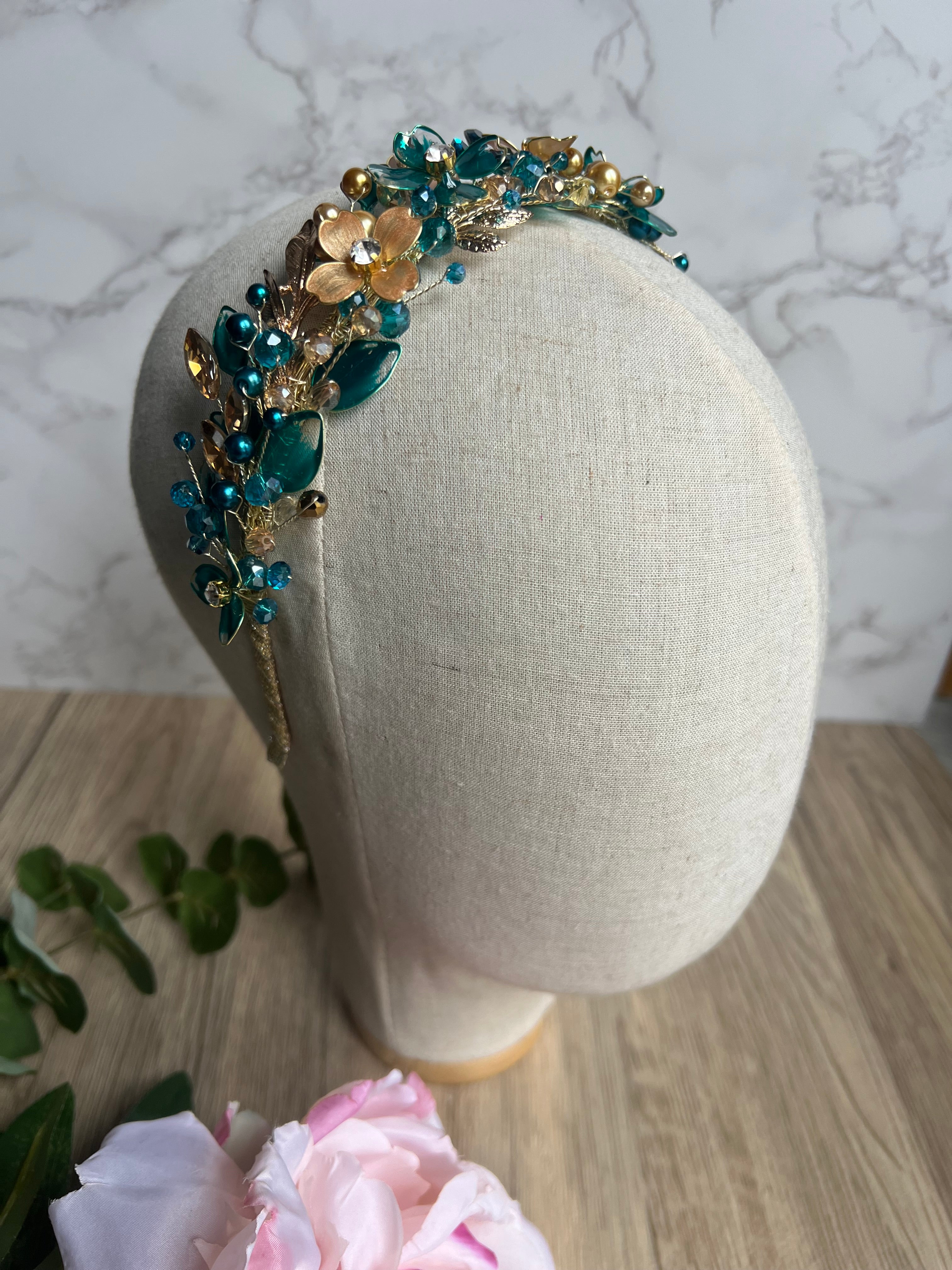 Teal low style wedding guest headpiece Teal low style wedding guest headpiece Precius pearls