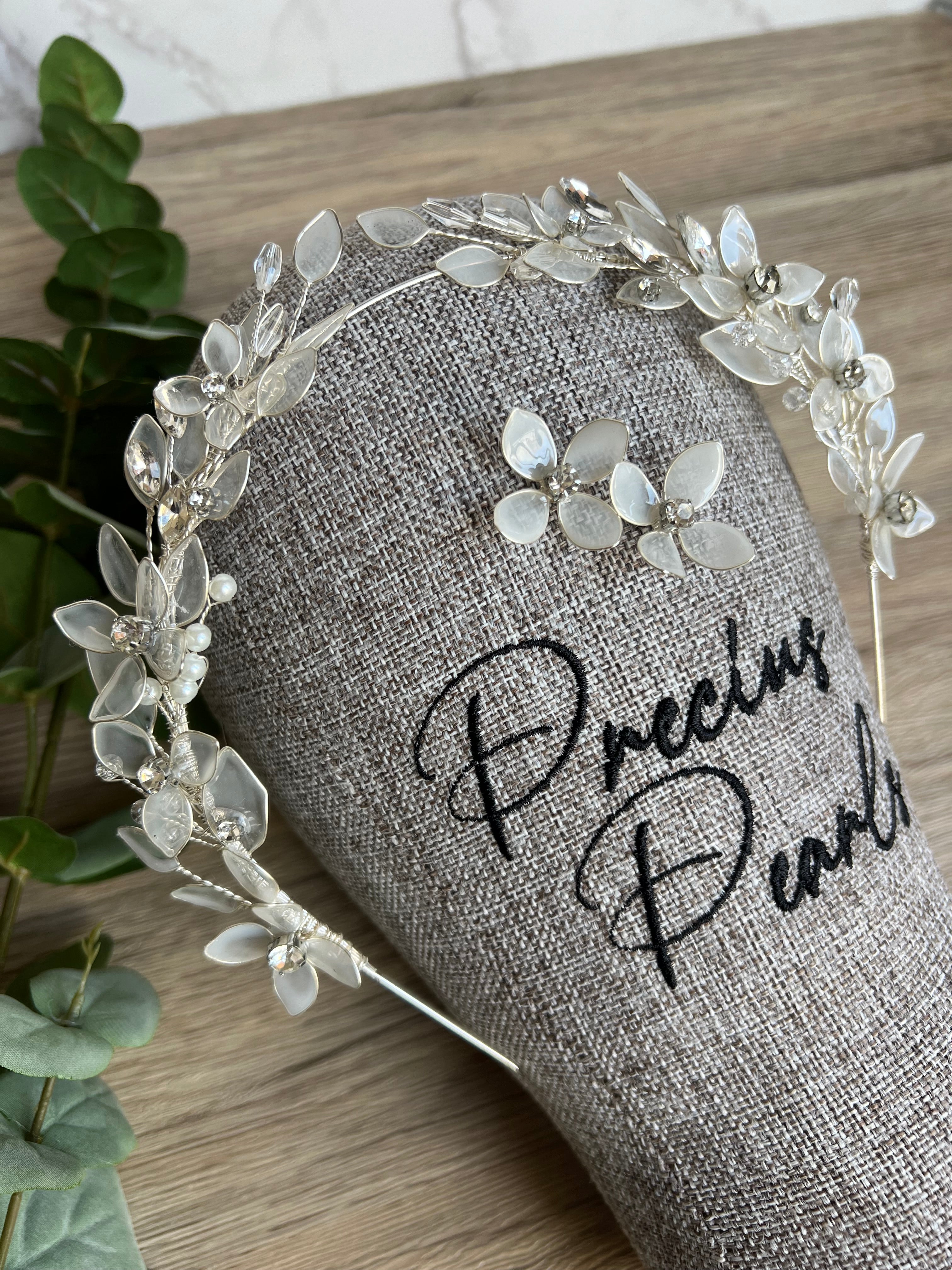 Milky white shade flower tiara Milky white shade flower tiara Precius pearls