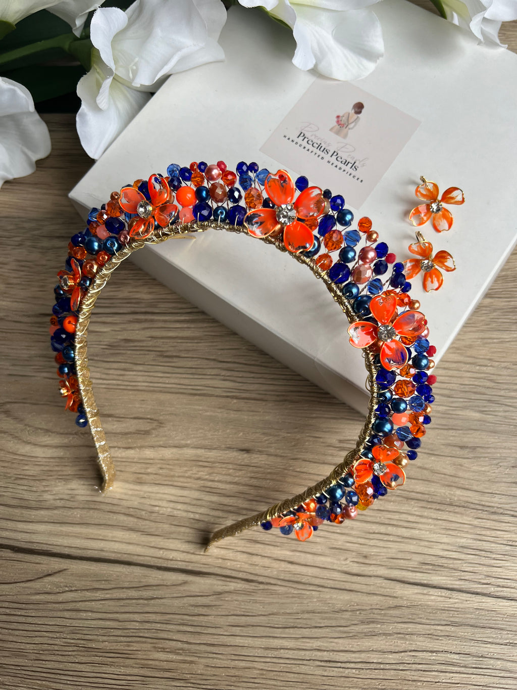 Royal Blue and Orange Flora crown Royal Blue and Orange Flora crown Precius pearls