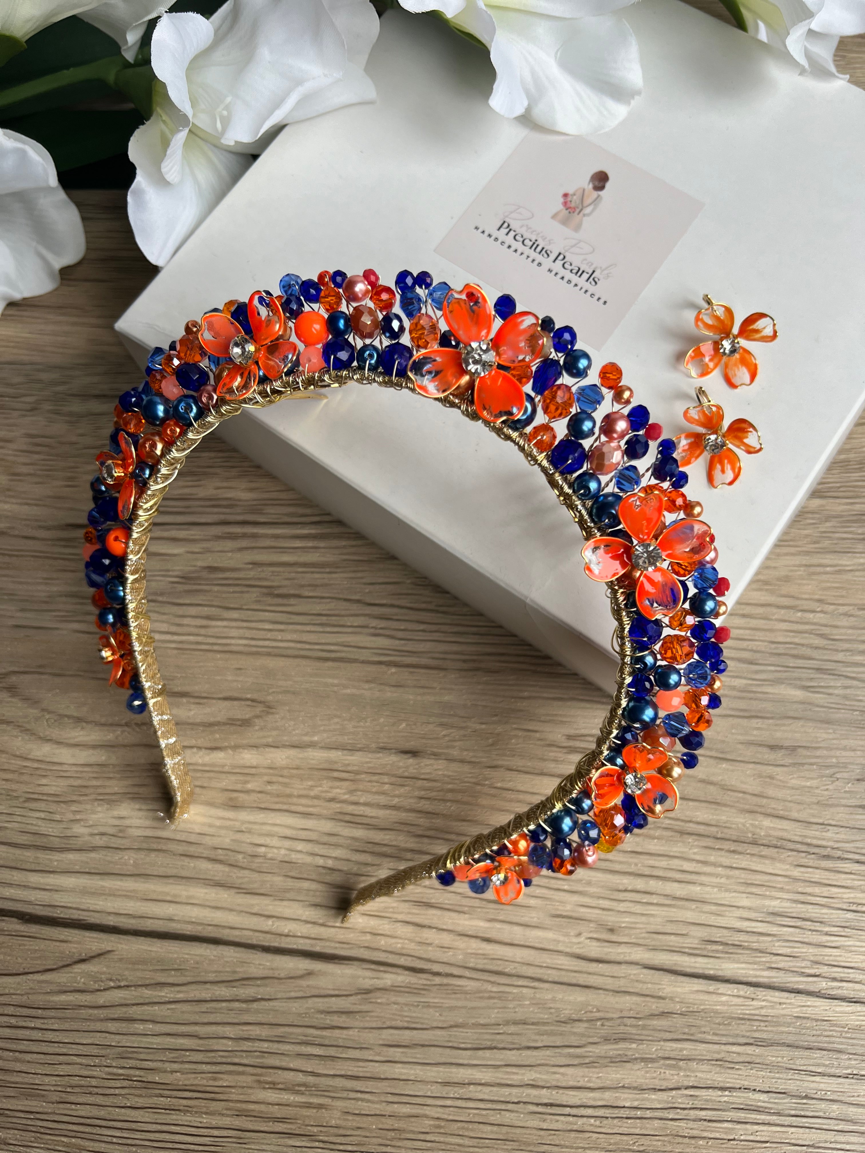 Royal Blue and Orange Flora crown Royal Blue and Orange Flora crown Precius pearls