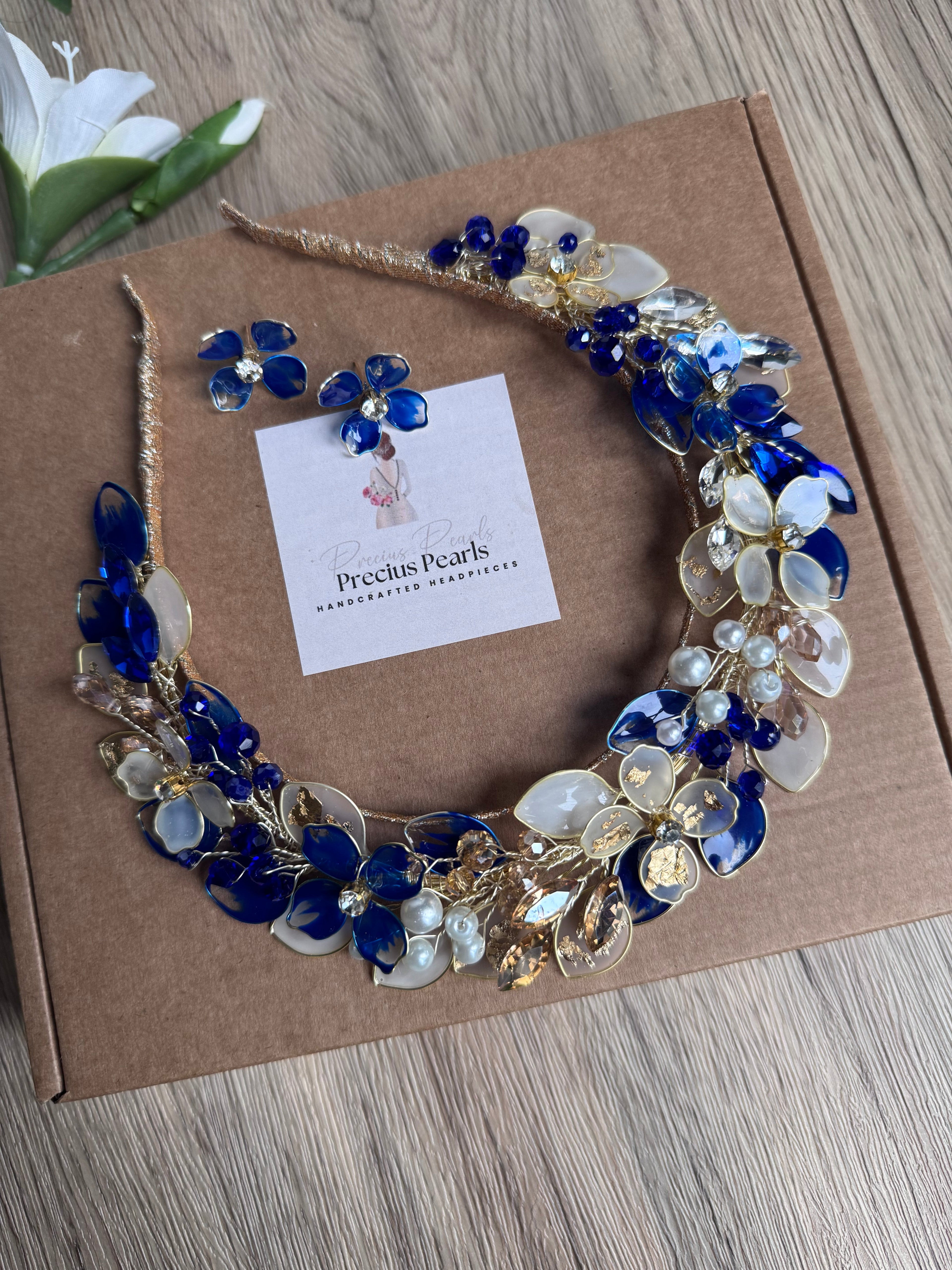 Royal blue, white and Gold halo headpiece Royal blue, white and Gold halo headpiece Precius pearls