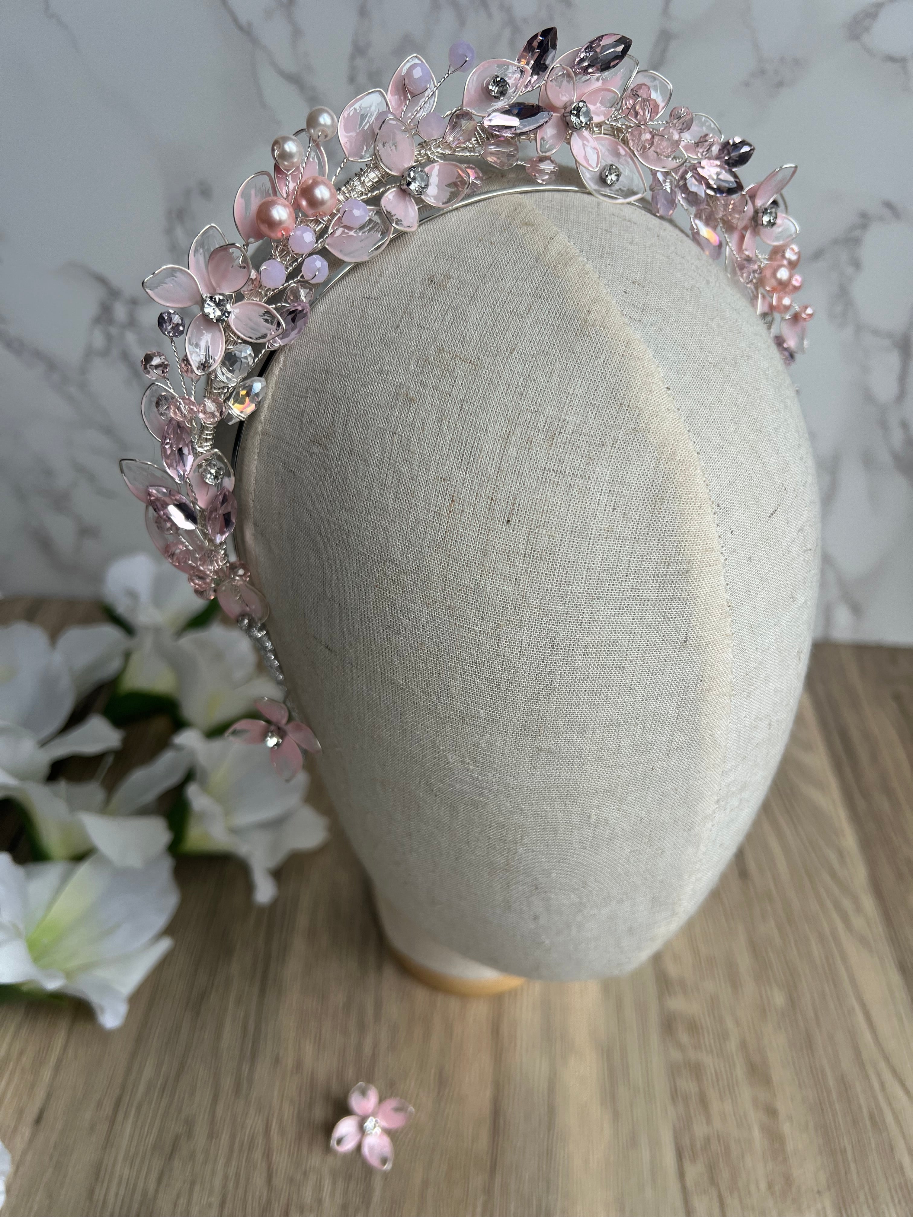 Pink flower and leaf detail wedding guest crown Pink flower and leaf detail wedding guest crown Precius pearls