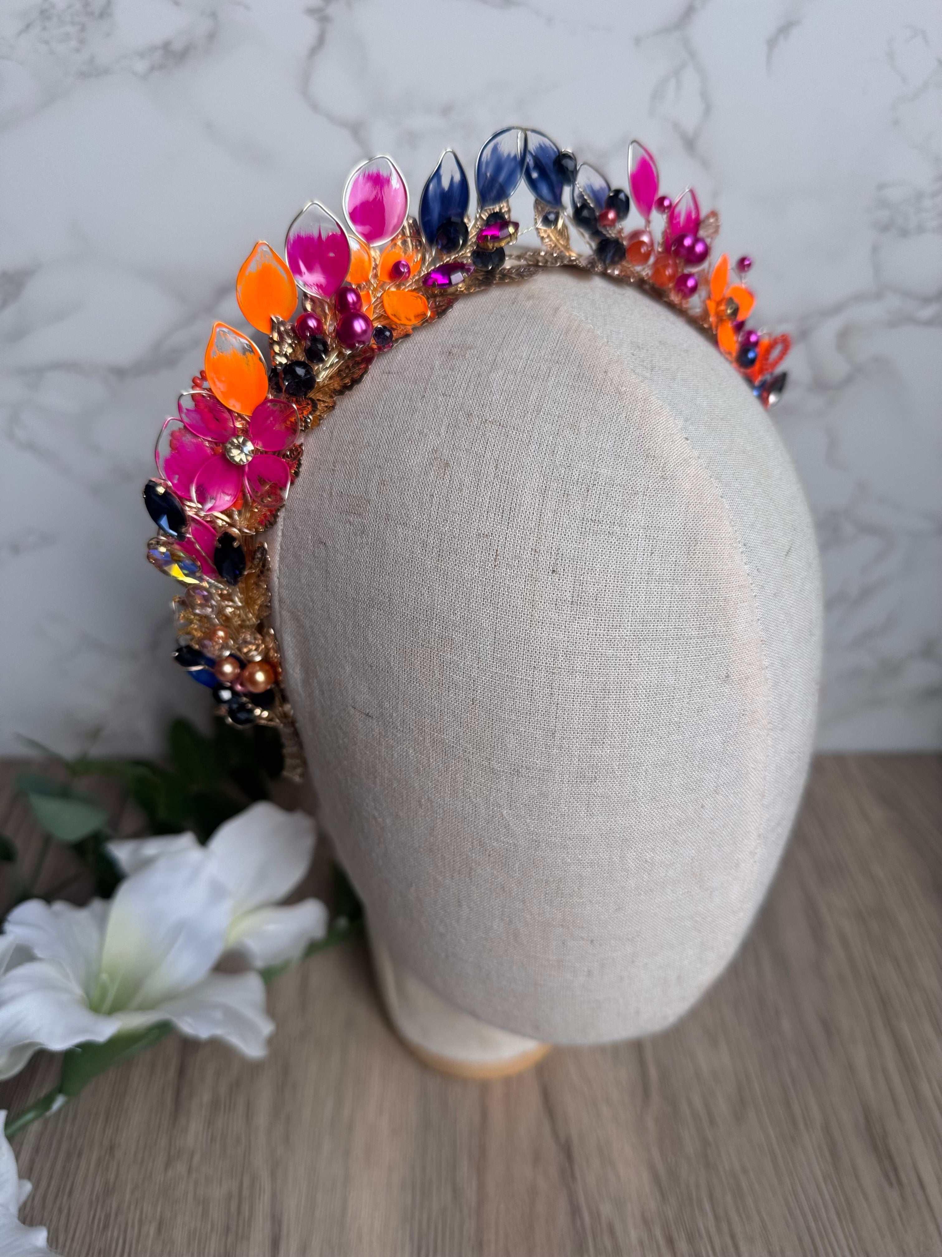 Fucshia, Navy and Orange pointed crown Fucshia, Navy and Orange pointed crown Precius pearls