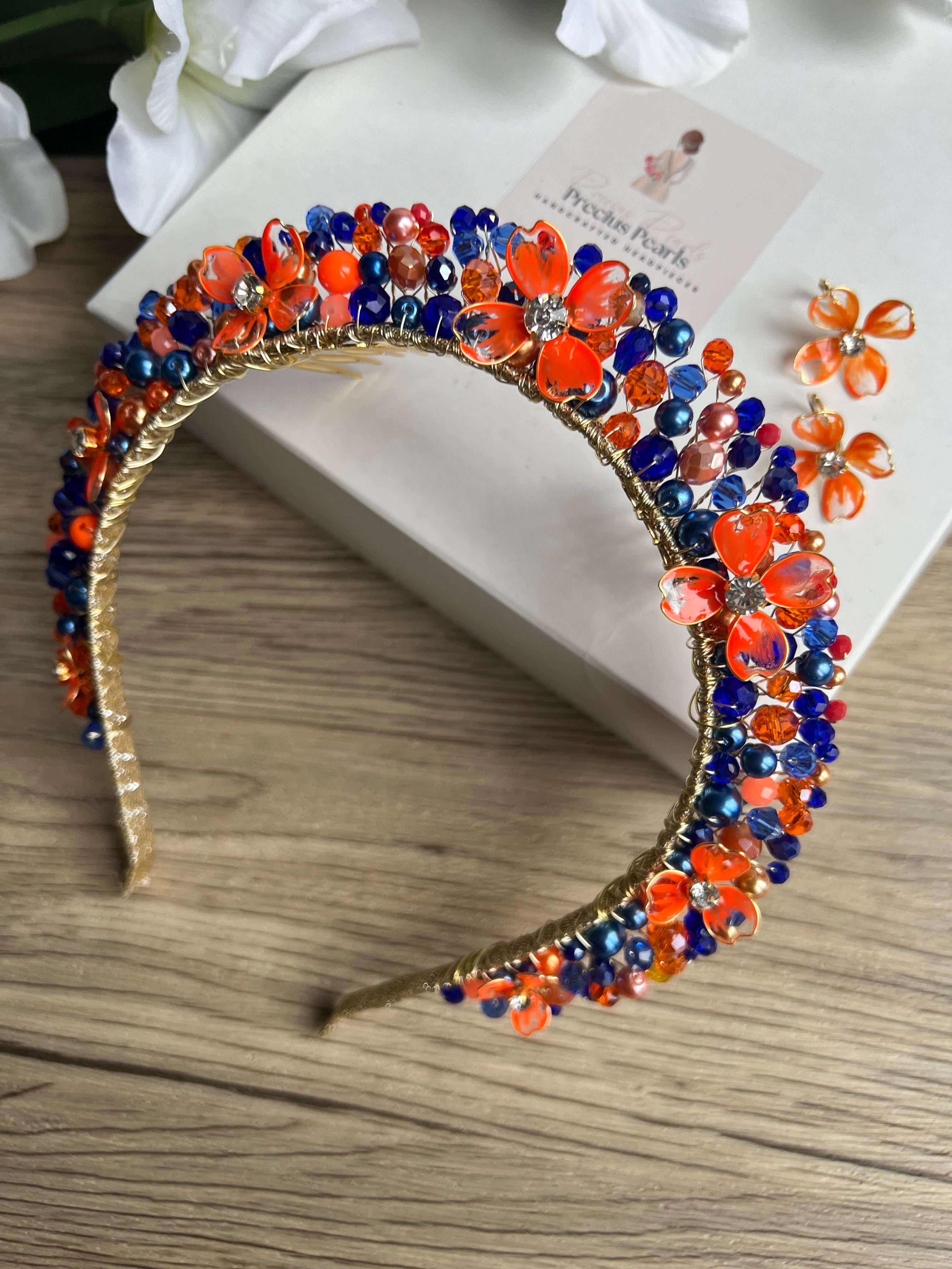 Royal Blue and Orange Flora crown Royal Blue and Orange Flora crown Precius pearls