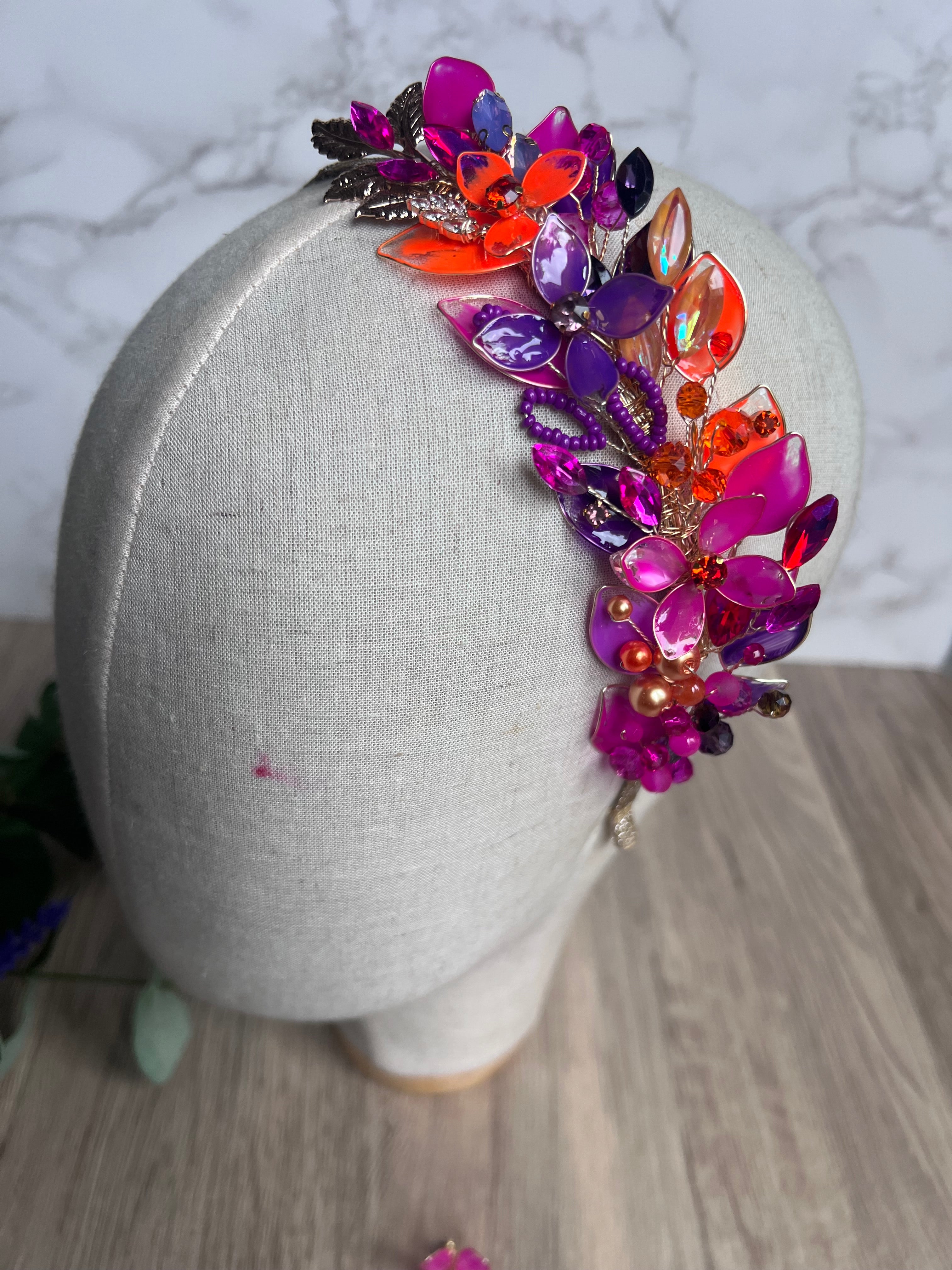 Fuchsia, Purple and Orange side headband Fuchsia, Purple and Orange side headband Precius pearls