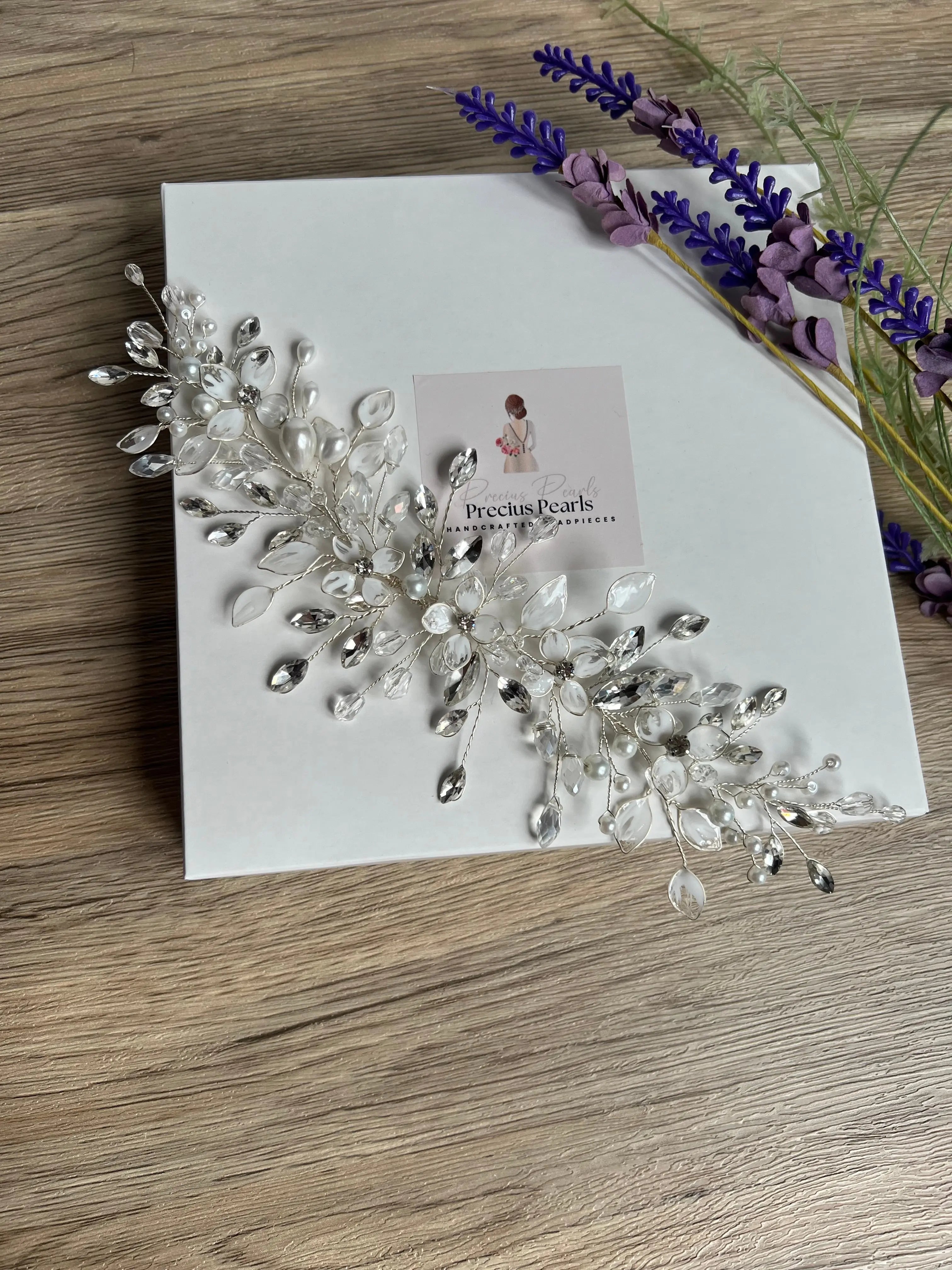 Delicate bridal vine with flowers and leaves Delicate bridal vine with flowers and leaves Precius pearls