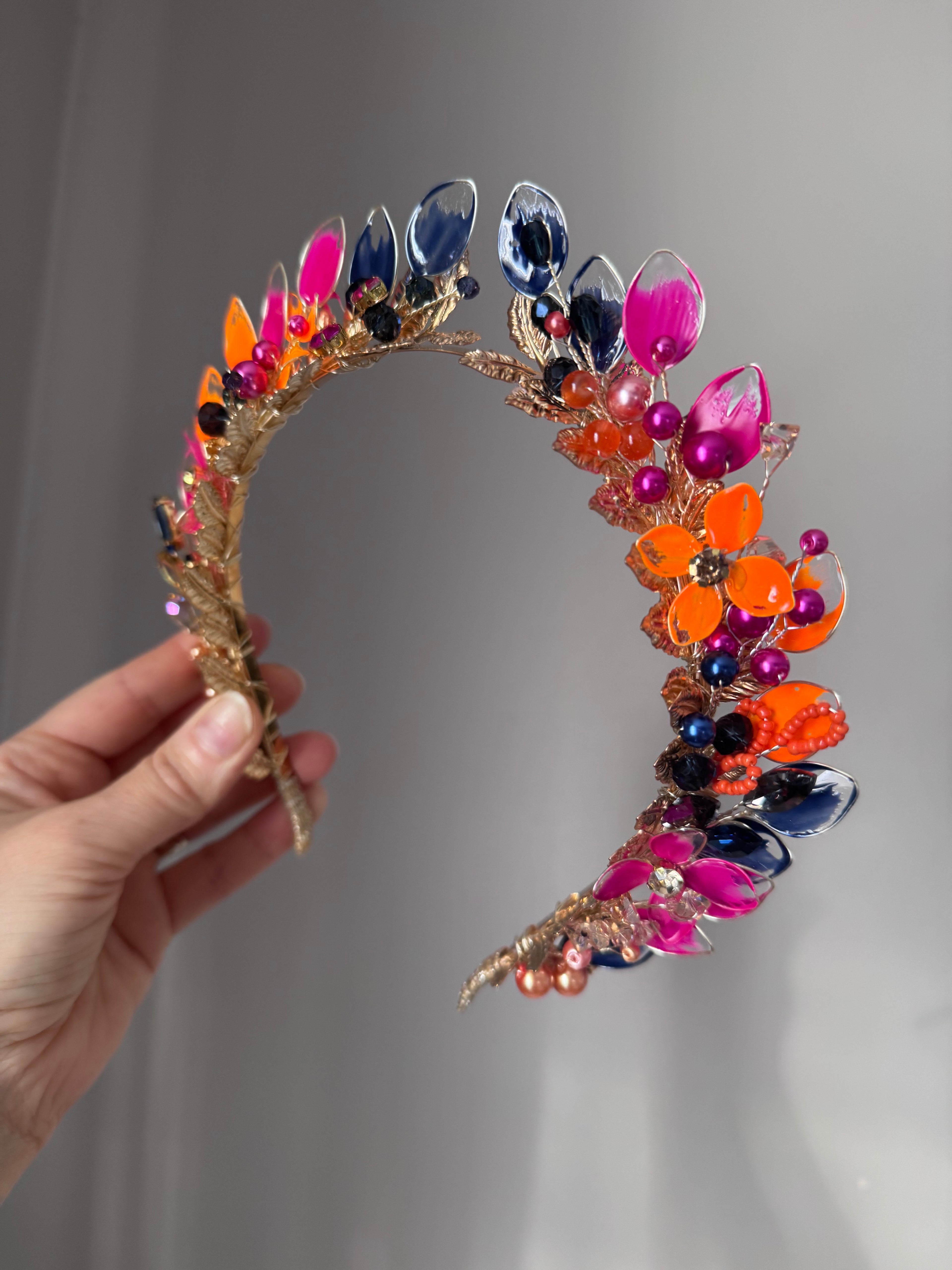 Fucshia, Navy and Orange pointed crown Fucshia, Navy and Orange pointed crown Precius pearls