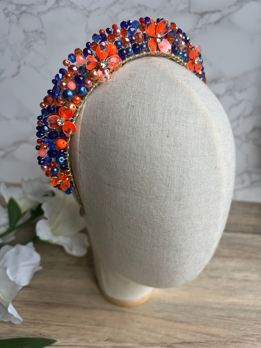 Royal Blue and Orange Flora crown Royal Blue and Orange Flora crown Precius pearls