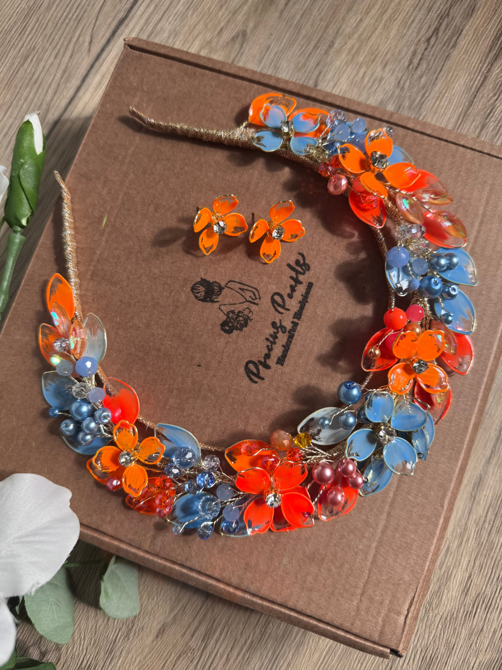 Light blue and Orange wedding guest halo Light blue and Orange wedding guest halo Precius pearls