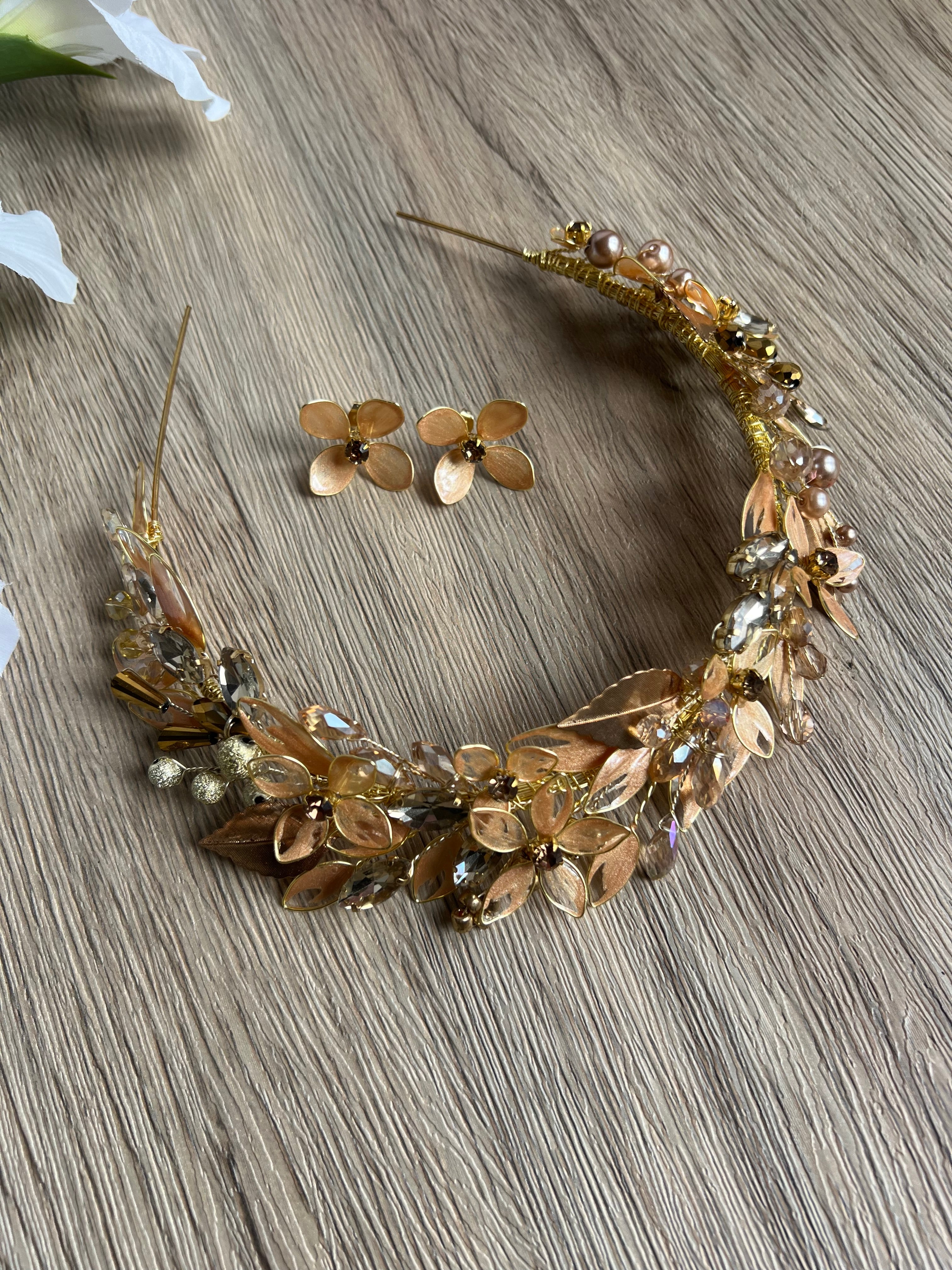 Golden leaf and flower wedding guest headpiece Golden leaf and flower wedding guest headpiece Precius pearls