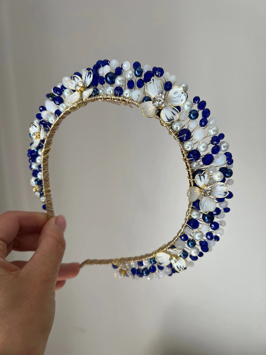 White and Majestic blue Flora crown