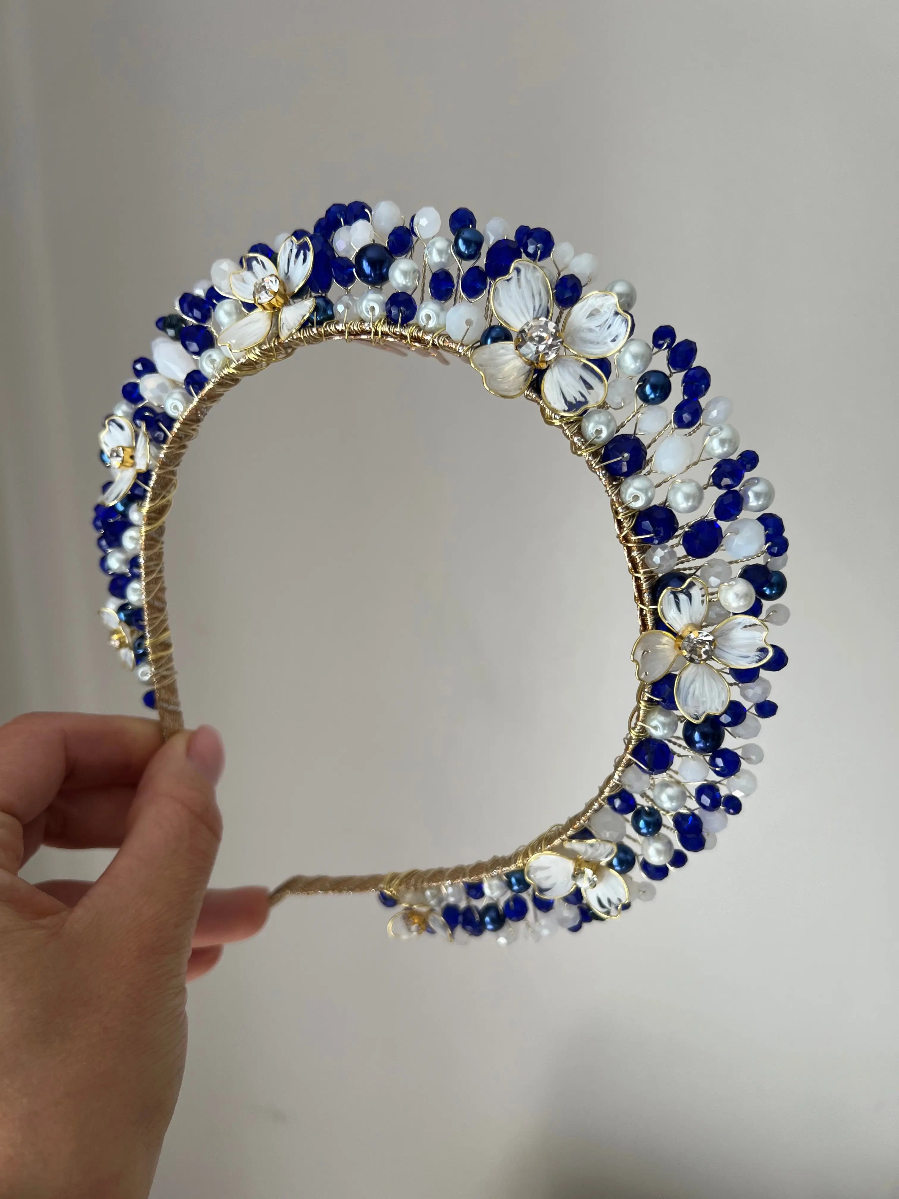 White and Majestic blue Flora crown