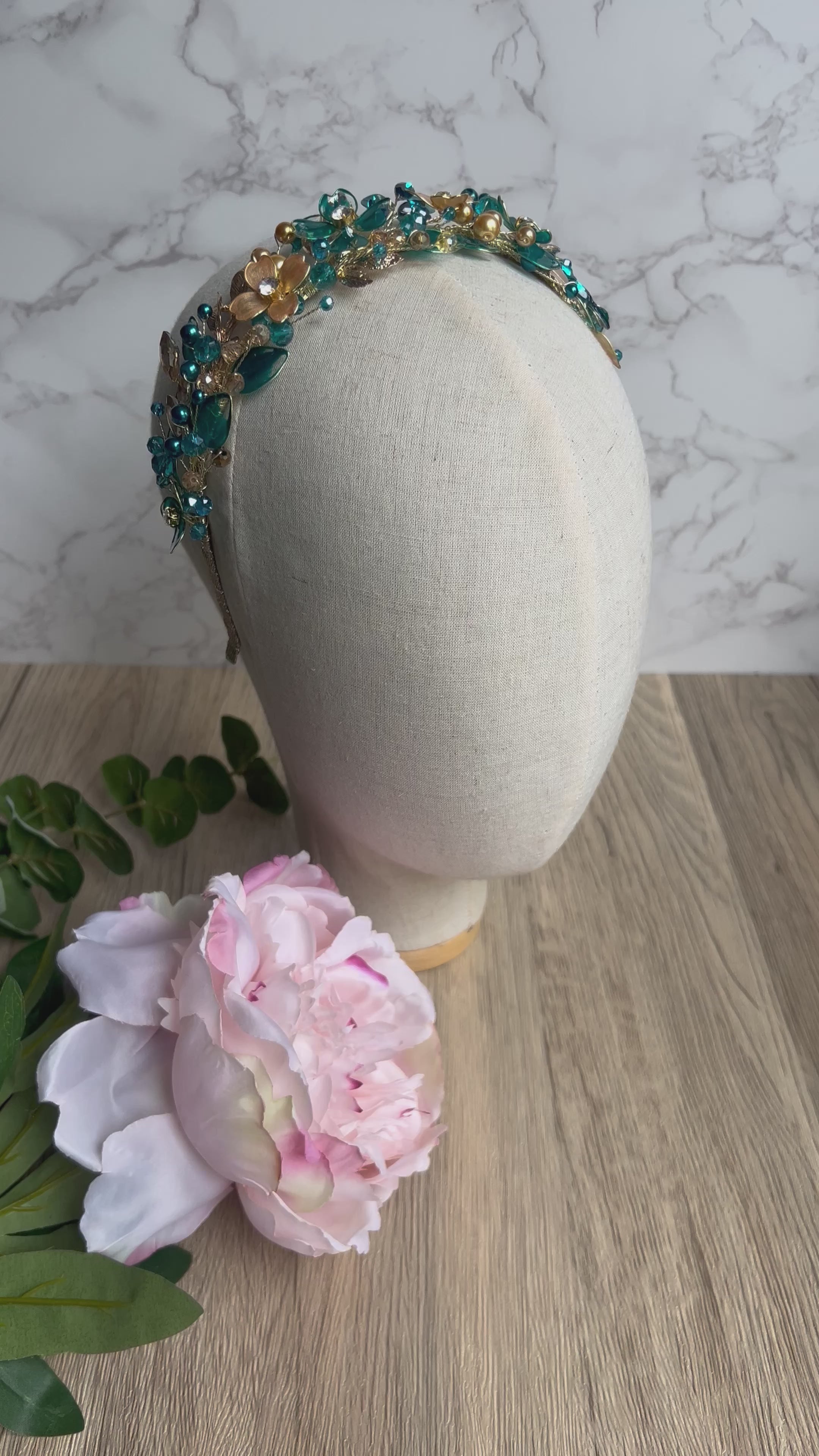 Teal low style wedding guest headpiece