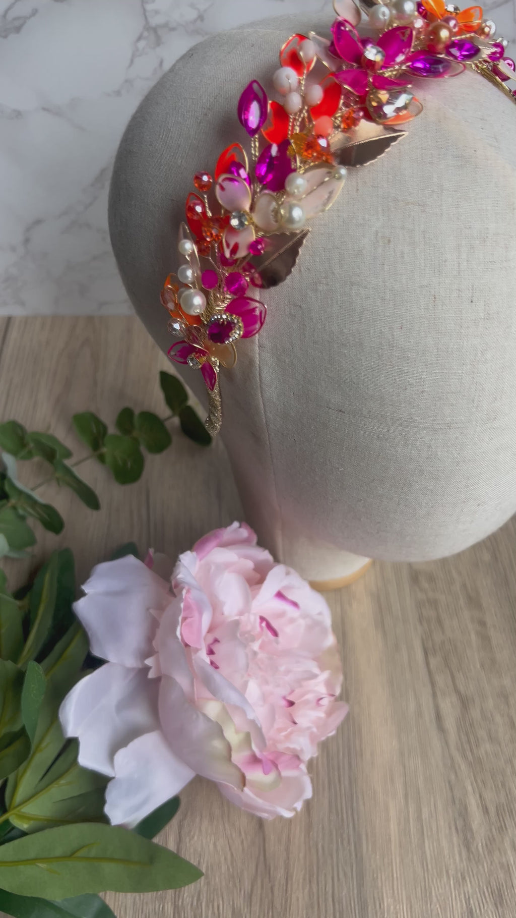 Stunning Orange and Fucshia low wedding guest headpiece