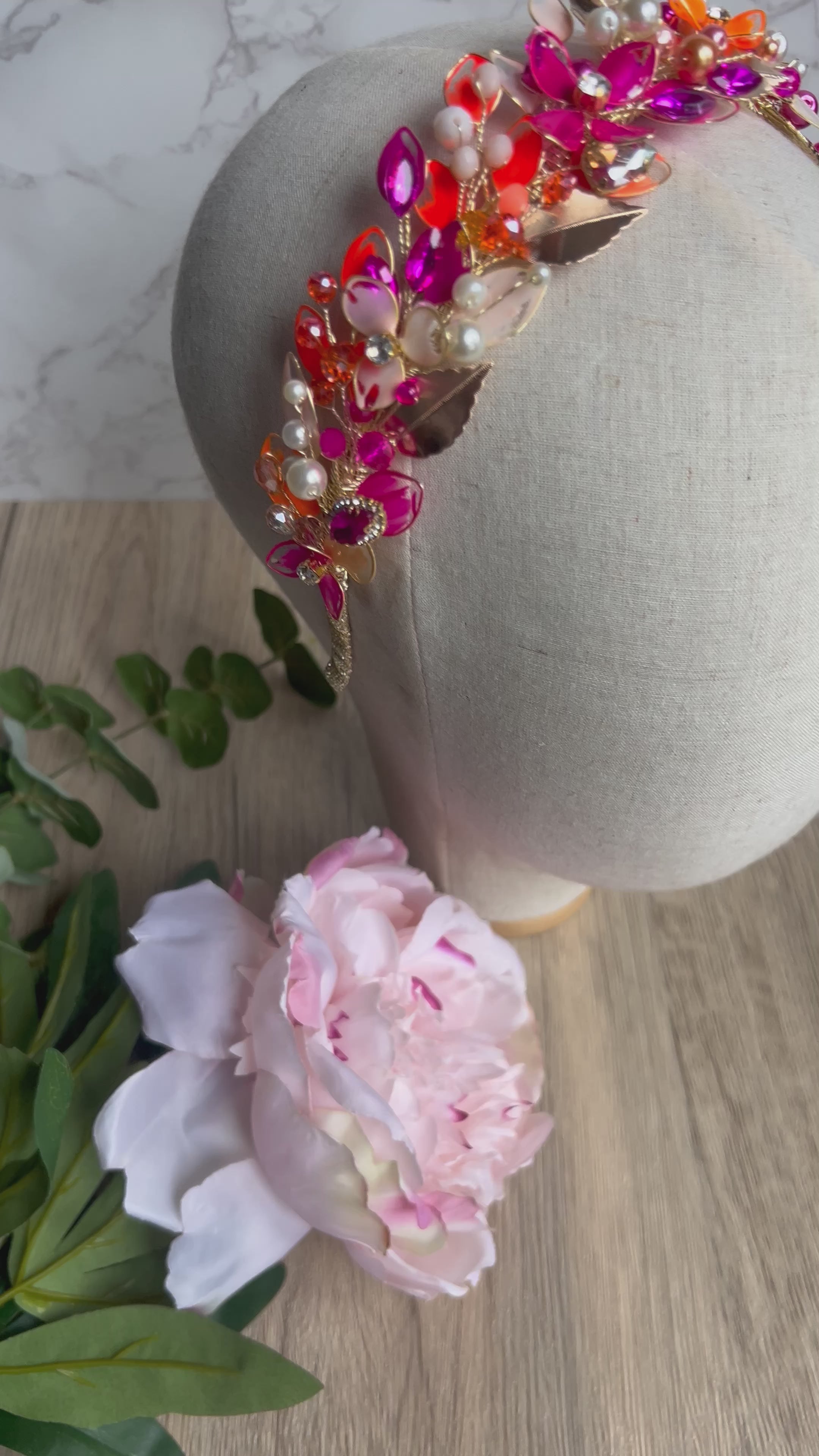 Stunning Orange and Fucshia low wedding guest headpiece