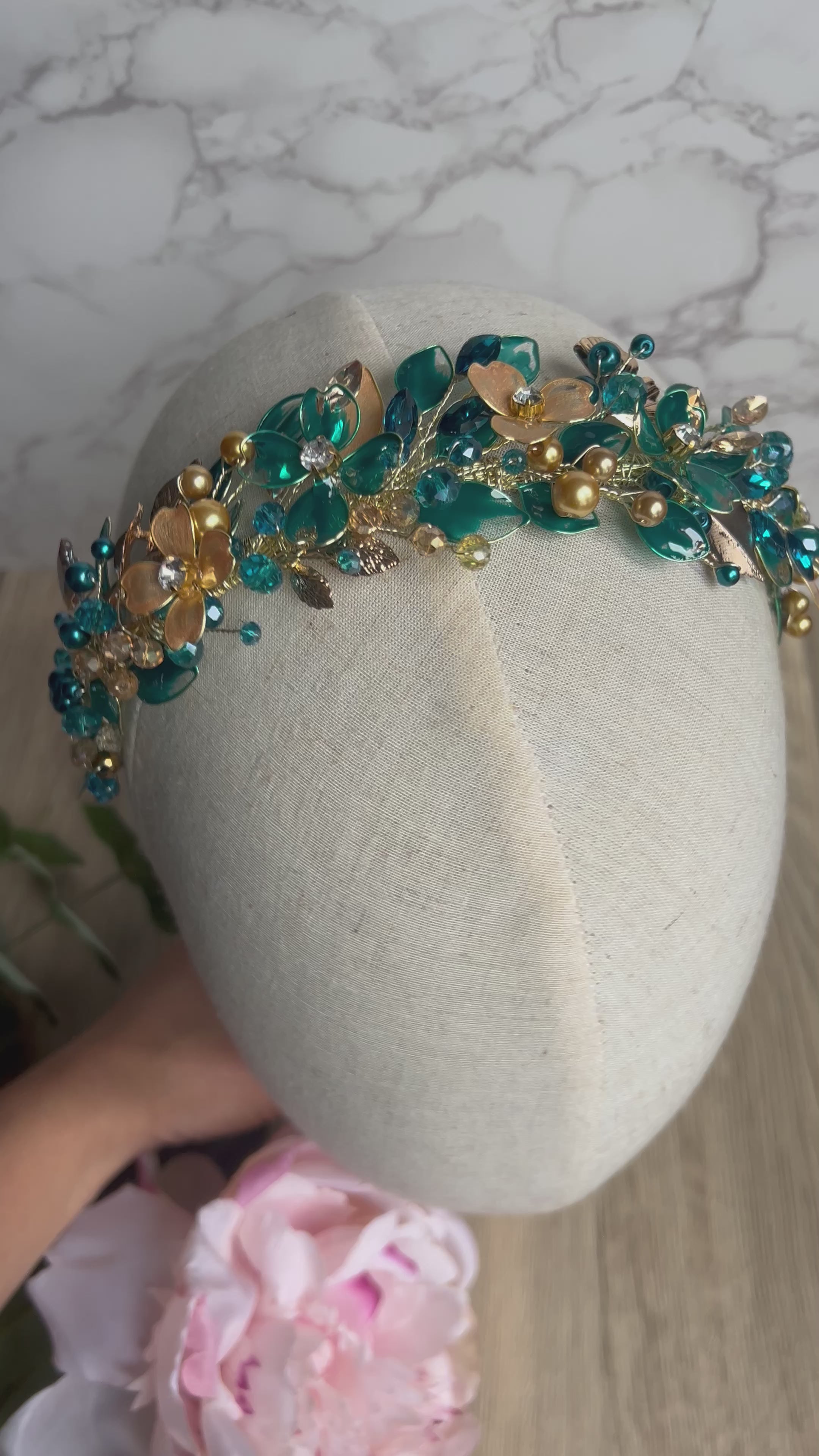 Teal low style wedding guest headpiece